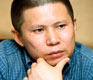 China legal activist freed, but may face tax case