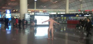 Naked Foreigner Restrained at Beijing Airport