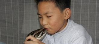 Dongguan Boy Slept with Python for 13 Years
