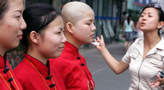 Zhejiang Company Forces Employees to Shave Their Heads