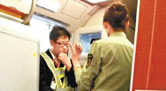 Military Official Tries to Delay HK Plane to Buy Cigarettes; Denied by Air Hostess