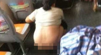 Woman Pulls Down Her Pants and Urinates on Bus in Chongqing