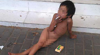 Naked Smoking 6-Year-Old Girl Spotted Begging on Nanjing Street
