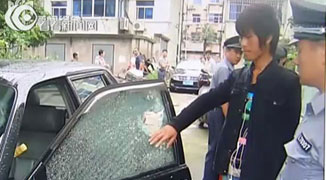 Man Smashes Car Window to Hide from Rain; Falls Asleep Inside and is Caught