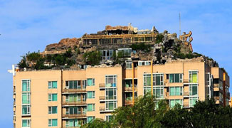 Impressive But Illegal: Beijing Professor Builds Fake Mountain Villa on Rooftop
