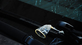Used Condom Thrown Out of Building Shatters Car Windshield