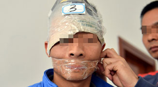 Guangdong Police Taped Up Prisoners Mouths to Prevent Collusion