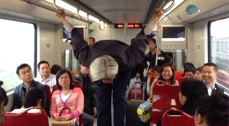 Super Cool 73 Year Old Grandpa Spontaneously Somersaults on Shanghai Metro