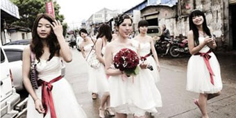 Women Compete to Work as Full Time Bridesmaid