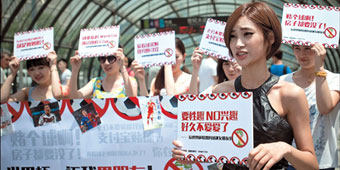 Shanghai Women Stage Protest- Claim World Cup Stole Their Husbands
