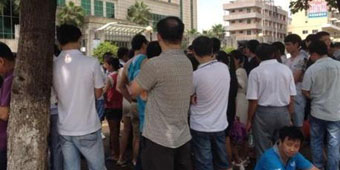 Factory Workers in Dongguan Strike after Company Cancels Moon Cakes, Bonus