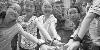 Spy Watches Lead to Parent- Teacher Dispute in Shanghai 