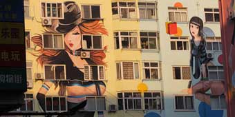 Residential Building in Qingdao Covered in Sexy Lady Paintings