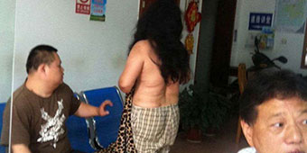 Changsha Woman Dragged Out of Home Naked for Surprise Demolition