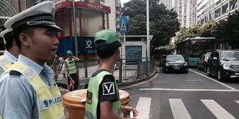 Jaywalkers Caught in Shenzhen Forced to Help Direct Traffic