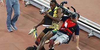 Usain Bolt Knocked Over By Cameraman on Segway 
