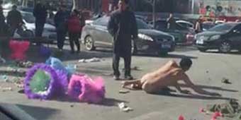 Rejected by Teacher, Student Rolls in Street Naked, Crying on Valentines’ Day