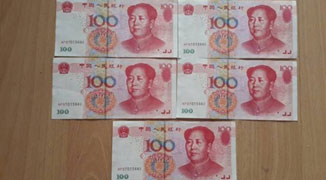 Man Withdraws Five Fake 100 RMB Bills from ATM in Beijing