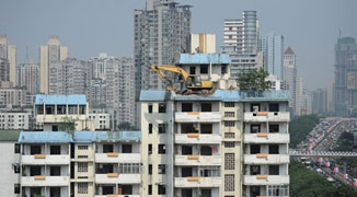 Demolition Bulldozer Spotted on Rooftop of 17 Floor Building in Chongqing