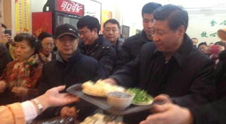 China’s President Xi Jinping Lines Up to Buy Steamed Buns